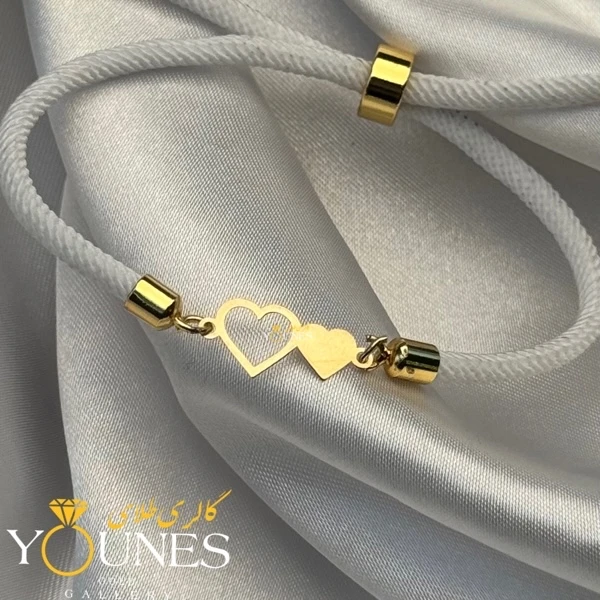 دستبند دو قلب پر و تو خالی طلا لیزری